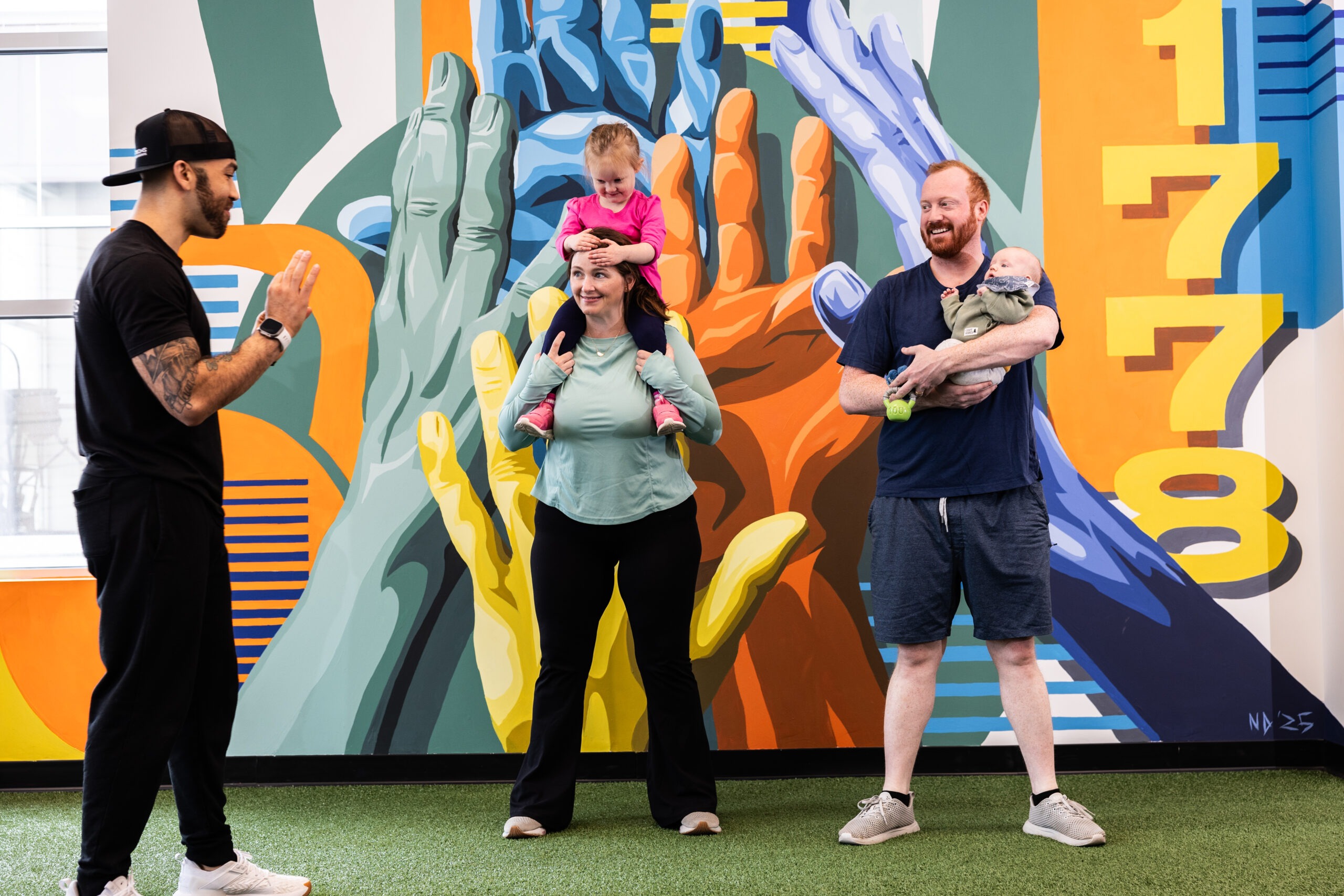 A married couple getting training instructions from Curtis